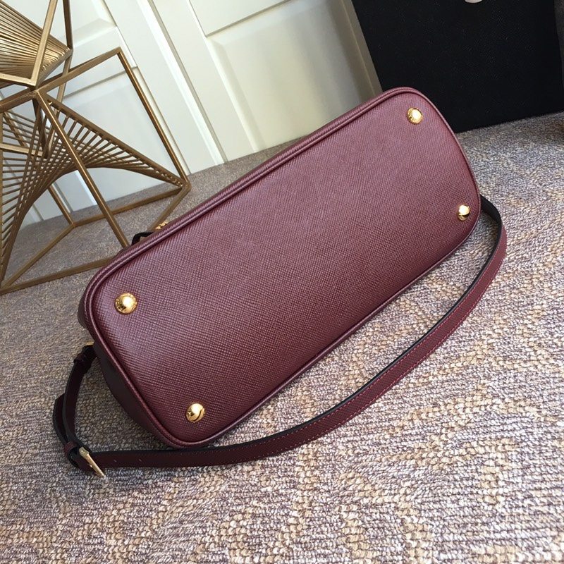 Pra*a top handle bags